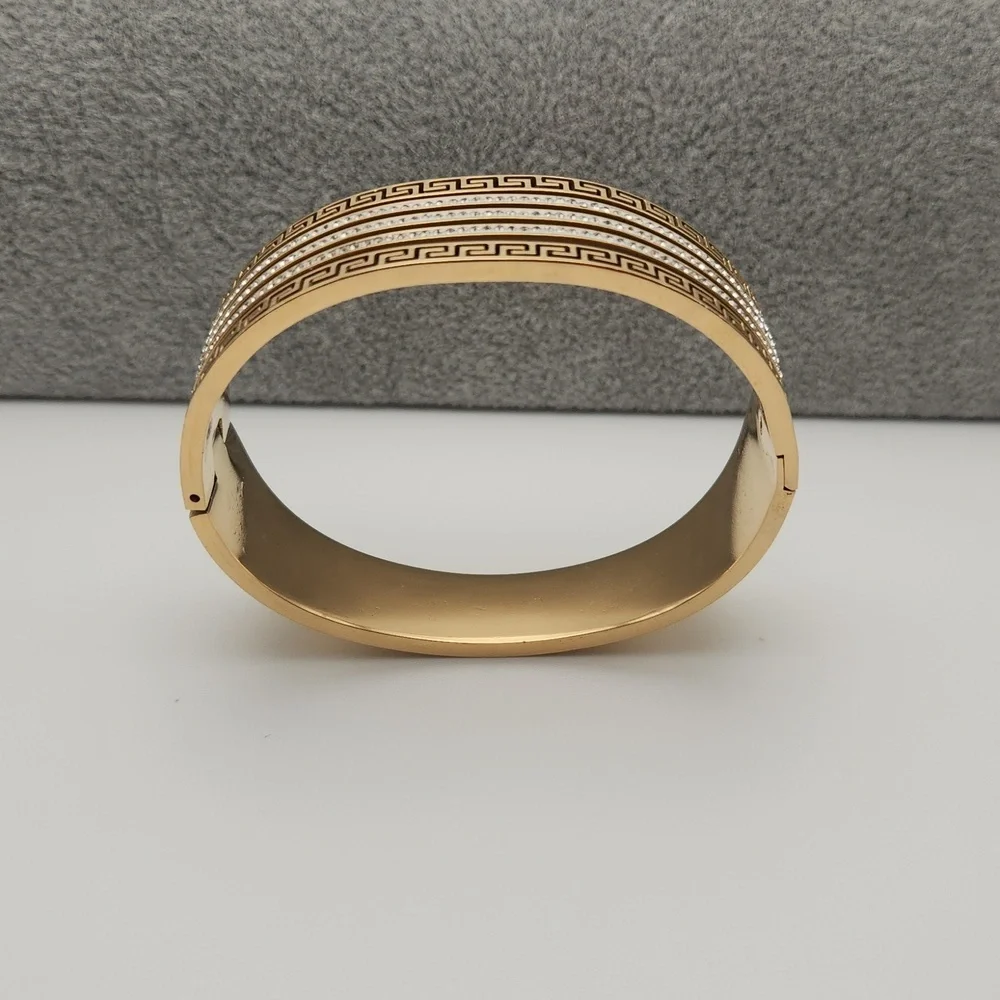 Elegant Gold-Tone Greek Key Bangle Bracelet with Crystal Accents - Picture 4 of 7